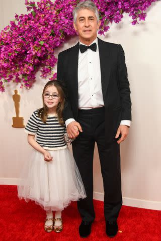 <p>Alberto Rodriguez/Variety via Getty</p> Alexander Payne and his 6-year-old daughter