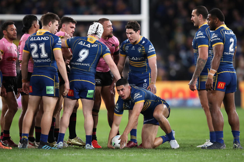 Dylan Brown (pictured on the ground) recovers after a spear tackle from Nathan Cleary.