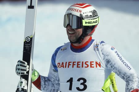 Alpine Skiing - FIS Alpine Skiing World Championships - Men's Downhill - St. Moritz, Switzerland - 12/2/17 - Beat Feuz of Switzerland reacts at the finish line. REUTERS/Denis Balibouse