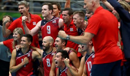 2016 Rio Olympics - Volleyball - Final - Men's Bronze Medal Match USA v Russia - Maracanazinho - Rio de Janeiro, Brazil - 21/08/2016. USA's (USA) team celebrates winning the match. REUTERS/Dominic Ebenbichler