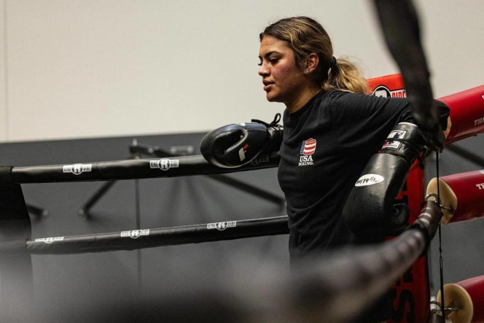 Yariela Bonilla takes a rest between training sessions at the Diamond Hill Boxing Gym.