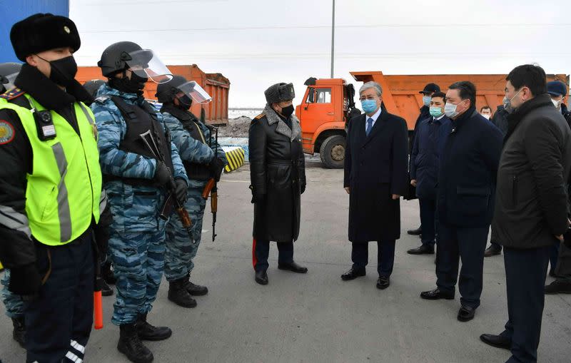 Kazakh President Kassym-Jomart Tokayev visits a checkpoint, set up to lock down Nur-Sultan to prevent the spread of coronavirus disease (COVID-19), on the outskirts of Nur-Sultan