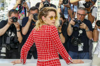 Kristen Stewart poses for photographers at the photo call for the film 'Crimes of the Future' at the 75th international film festival, Cannes, southern France, Tuesday, May 24, 2022. (Photo by Joel C Ryan/Invision/AP)