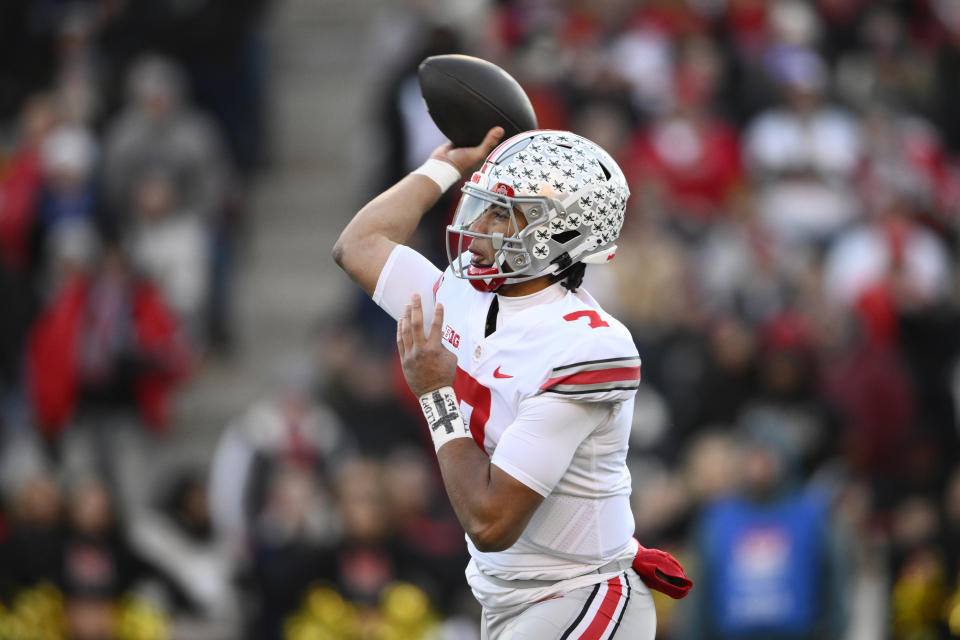 Ohio State quarterback C.J. Stroud (7) passes during the first half of an NCAA college football game against Maryland, Saturday, Nov. 19, 2022, in College Park, Md. (AP Photo/Nick Wass)