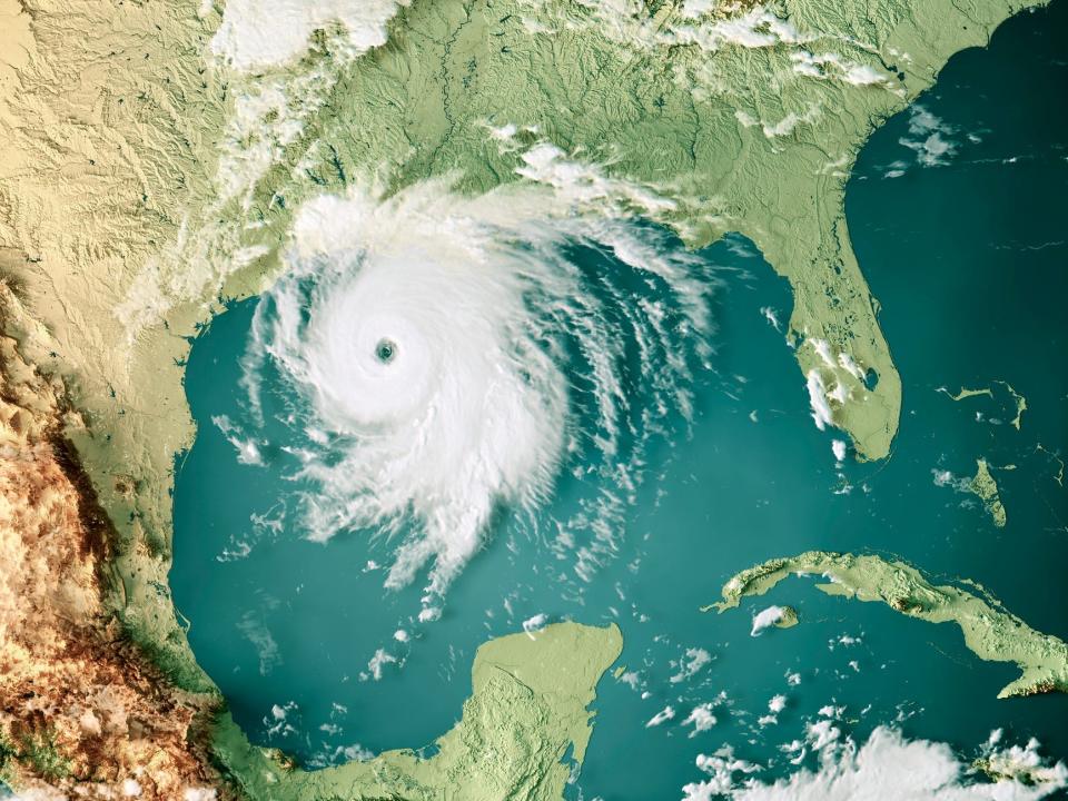 A hurricane shown from above approaching landfall in the southern US.