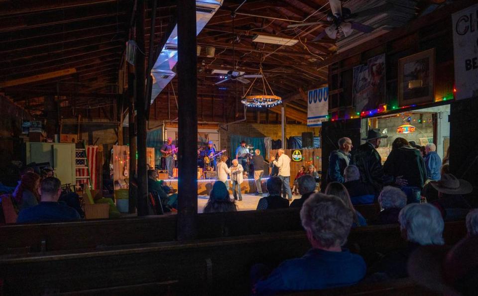 The view from the pews in the back of The Mildred Store’s dance hall. The seating was purchased for $100 from a church in Mound City. Emily Curiel/ecuriel@kcstar.com