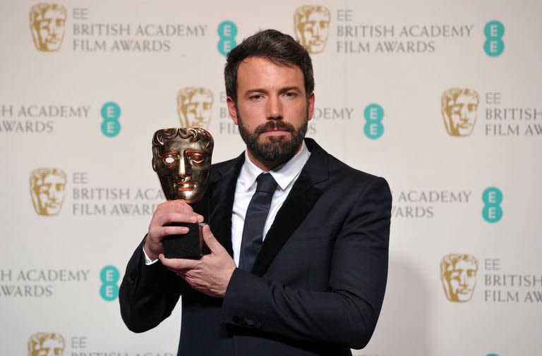 US actor and director Ben Affleck poses with Best Director award for his film Argo during the annual BAFTA British Academy Film Awards at the Royal Opera House in London on February 10, 2013