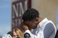 Former New Mexico State NCAA college basketball player Deuce Benjamin breaks down in tears while speaking at a news conference in Las Cruces, N.M., Wednesday, May 3, 2023. Benjamin and former Aggie player Shak Odunewu discussed the lawsuit they filed alleging teammates ganged up and sexually assaulted them multiple times, while their coaches and others at the school didn't act when confronted with the allegations. (AP Photo/Andres Leighton)