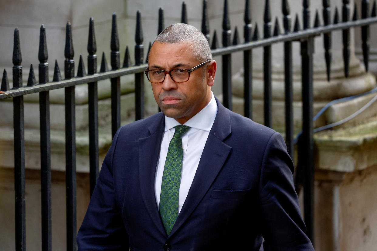 James Cleverly walks outside Number 10 Downing Street, in London, Britain, October 25, 2022. REUTERS/Peter Nicholls