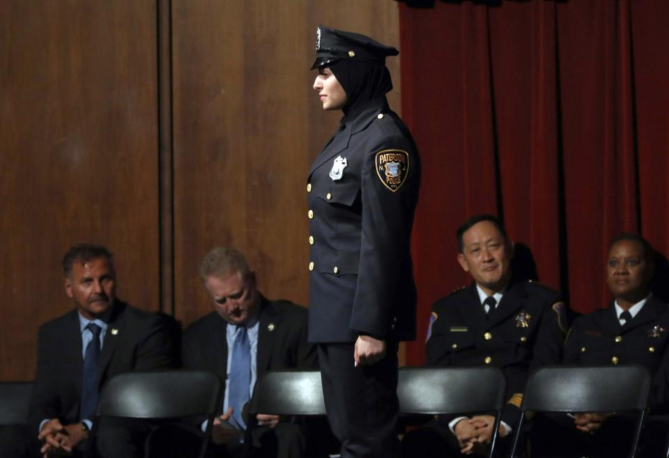 Serein Tamimi waits to receive her certificate during Bergen County Police Academy graduation at Bergen County Academies in Hackensack June 13, 2019. Tamimi was sworn in as the first Palestinian American woman and hijab-wearing police officer in Paterson this week.