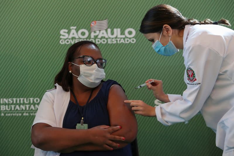 Health workers receive China's Sinovac coronavirus disease (COVID-19) vaccine, in Sao Paulo