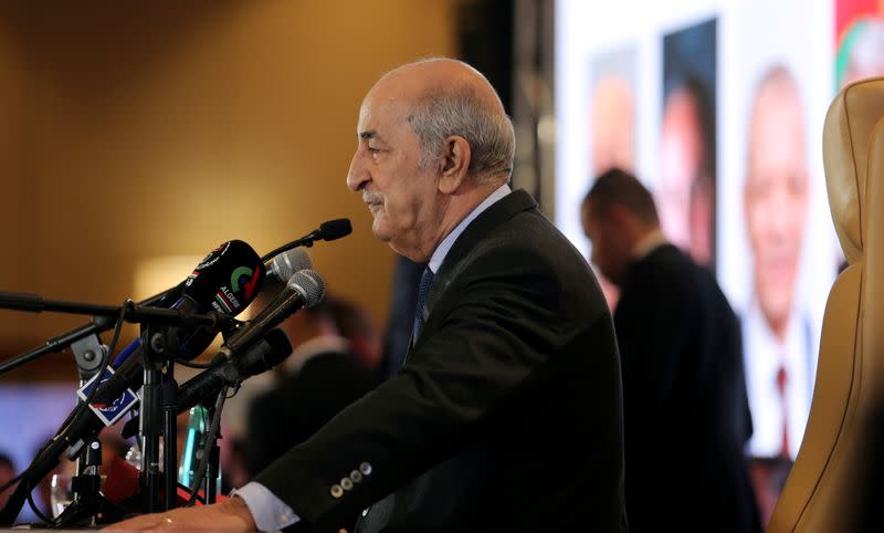 FILE PHOTO: Newly elected president Abdelmadjid Tebboune talks to the press during a news conference, in Algiers,