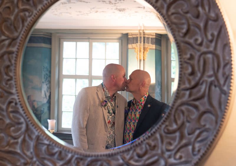 Carnier and Leu kiss each other after their wedding ceremony at the registry office in Schaffhausen