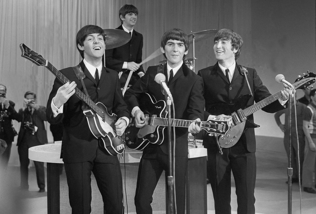 <span>The Beatles prepare for their first appearance on The Ed Sullivan Show in New York on 9 February 1964.</span><span>Photograph: CBS photo archive/CBS/Getty Images</span>