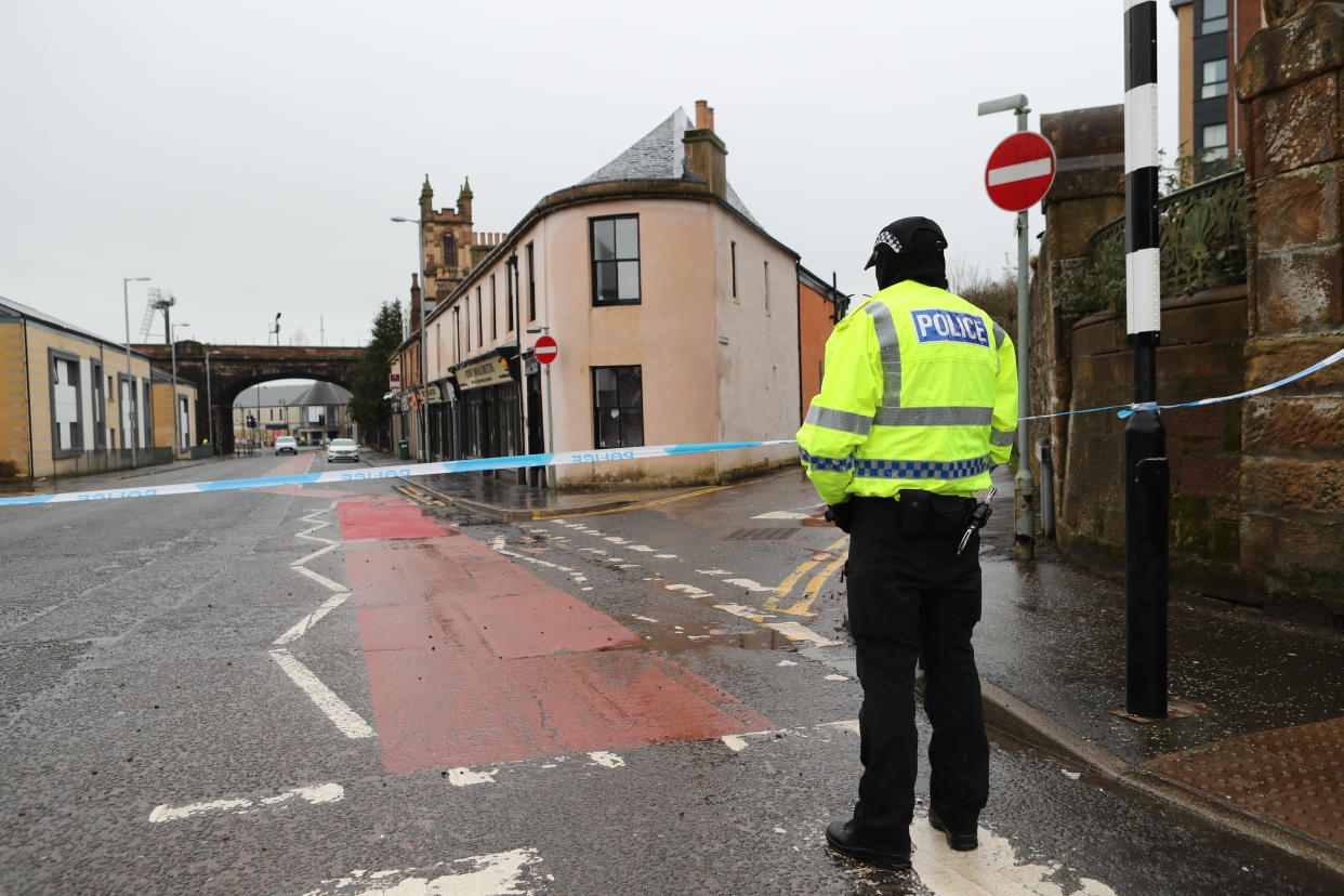 The scene on Portland Street in Kilmarnock, Ayrshire, where a 24-year-old woman was stabbed and later died in hospital. A 39-year old woman was also killed and a man died in a car crash in three incidents police believe are linked in the Kilmarnock area. Picture date: Friday February 5, 2021.