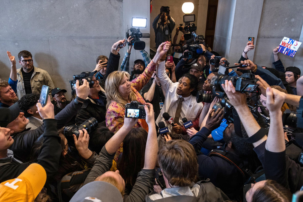 Democratic state Reps. Gloria Johnson of Knoxville and Justin Jones of Nashville raise their arms in defiance after a vote that expelled Jones from the governing body on April 6, 2023 in Nashville, Tennessee. Jones was expelled after he, Johnson and Rep. Justin Pearson of Memphis led a protest at the Tennessee State Capital building in the wake of a mass shooting at a Christian school in which three 9-year-old students and three adults were killed by a 28-year-old former student of the school on March 27. Johnson and Pearson also face expulsion. (Seth Herald / Getty Images)