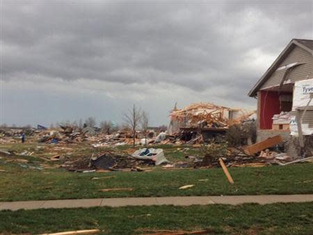 Tornado damage in Washington Illinois can be seen in this handout picture courtesy of Alexandra Sutter/WMBD.com taken November 17, 2013. REUTERS/Alexandra Sutter/WMBD.com/Handout via Reuters