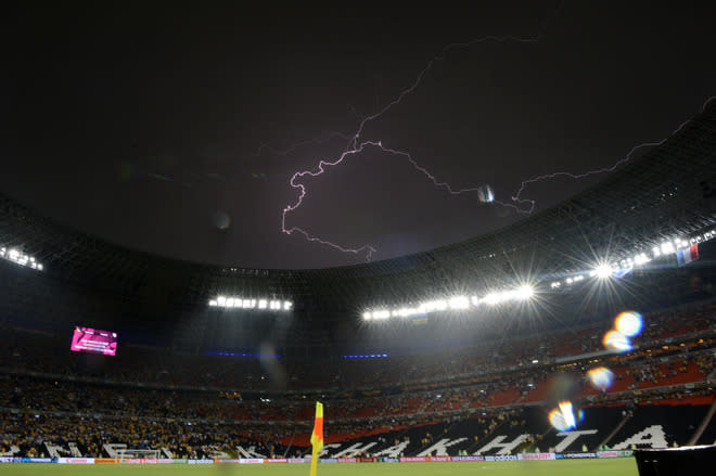 TOPSHOTS A lighting is pictured as the Euro 2012 championships football match Ukraine vs France is suspended due to heavy rainfall on June 15, 2012 at the Donbass Arena in Donetsk. AFP PHOTO/ FRANCK FIFEFRANCK FIFE/AFP/GettyImages