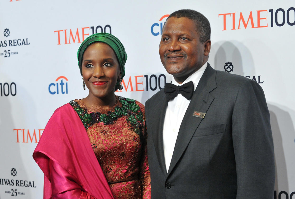 The next Arsenal owner? | Dangote pictured in 2014 with daughter Halima: NEW YORK, NY - APRIL 29: Halima Dangote (L) and Honoree Aliko Dangote attend the TIME 100 Gala, TIME's 100 most influential people in the world, at Jazz at Lincoln Center on April 29, 2014 in New York City. (Photo by Ben Gabbe/Getty Images for TIME)