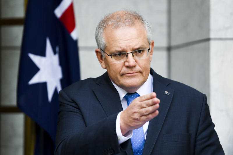 Australian Prime Minister Scott Morrison speaks to the media during a press conference following a national cabinet meeting, at Parliament House in Canberra.