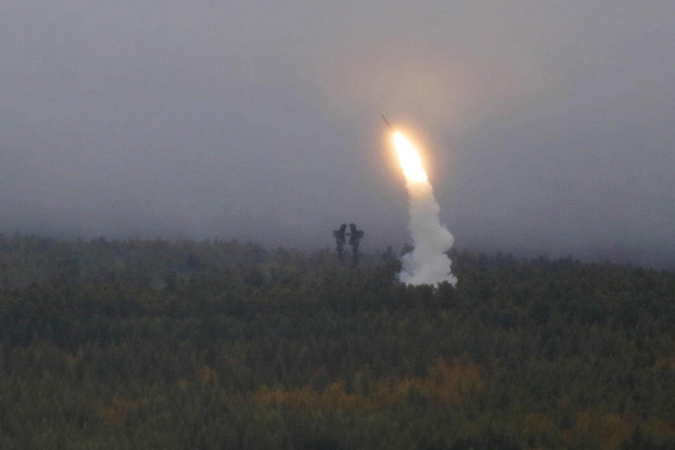 An air defense missile system flies during a military exercises on training ground "Telemba", about 80 kilometers (50 miles ) north of the city of Chita during the military exercises Vostok 2018 in Eastern Siberia, Russia, Wednesday, Sept. 12, 2018. Hundreds of thousands Russian troops swept across Siberia on Tuesday in the nation's largest ever war games also joined by China — a powerful show of burgeoning military ties between Moscow and Beijing amid their tensions with the U.S. (AP Photo/Sergei Grits)