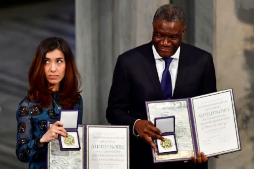 Iraqi Yazidi activist Nadia Murad (L) and Congolese gynecologist Denis Mukwege (R) called on the world to do more to help victims