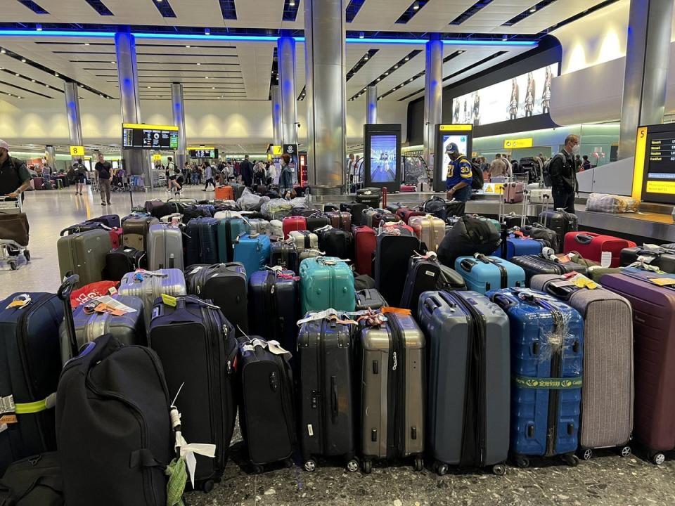 Mountains of luggage at Heathrow Airport in June 2022 (Lori Harito/SWNS)