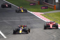 Red Bull driver Max Verstappen of the Netherlands leads Ferrari driver Carlos Sainz of Spain during the sprint race at the Chinese Formula One Grand Prix at the Shanghai International Circuit, Shanghai, China, Saturday, April 20, 2024. (AP Photo/Andy Wong)
