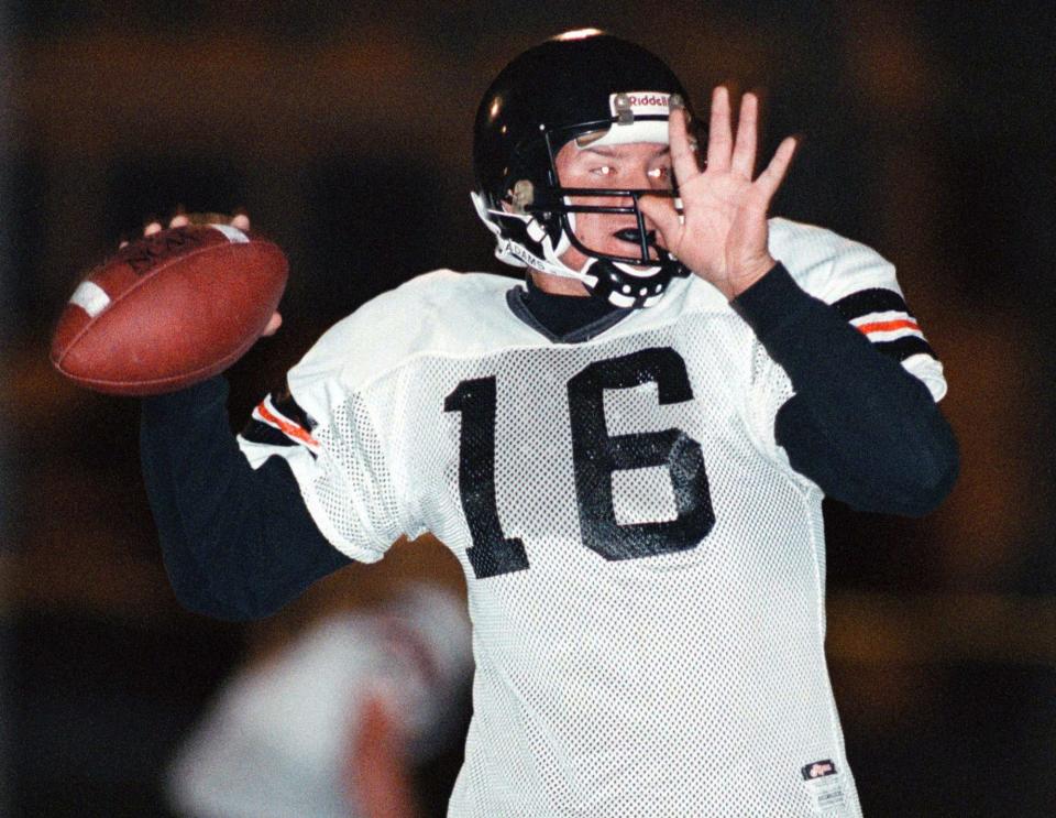 Burlington's Tony Romo looks to pass during a game against Case High School in Racine, Wis., on Sept. 26, 1997.