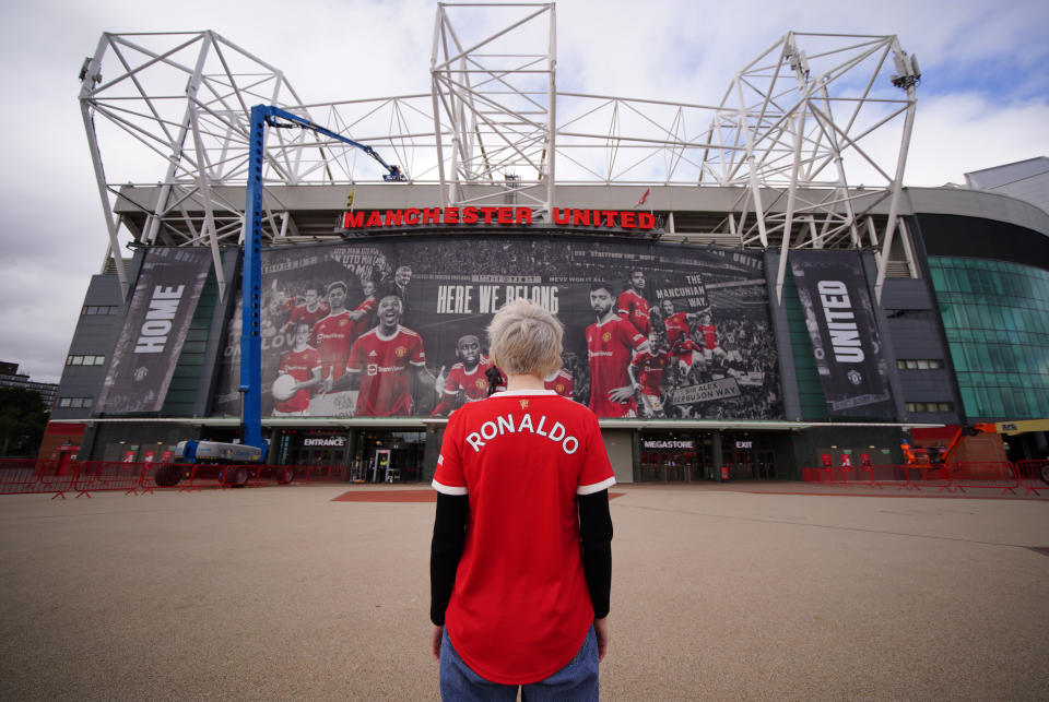 Manchester United fan Martha Quinn outside Old Trafford with a 'Ronaldo' shirt after Manchester United completed the signing of Cristiano Ronaldo on a two-year contract from Juventus. Picture date: Tuesday August 31, 2021. (Photo by Peter Byrne/PA Images via Getty Images)