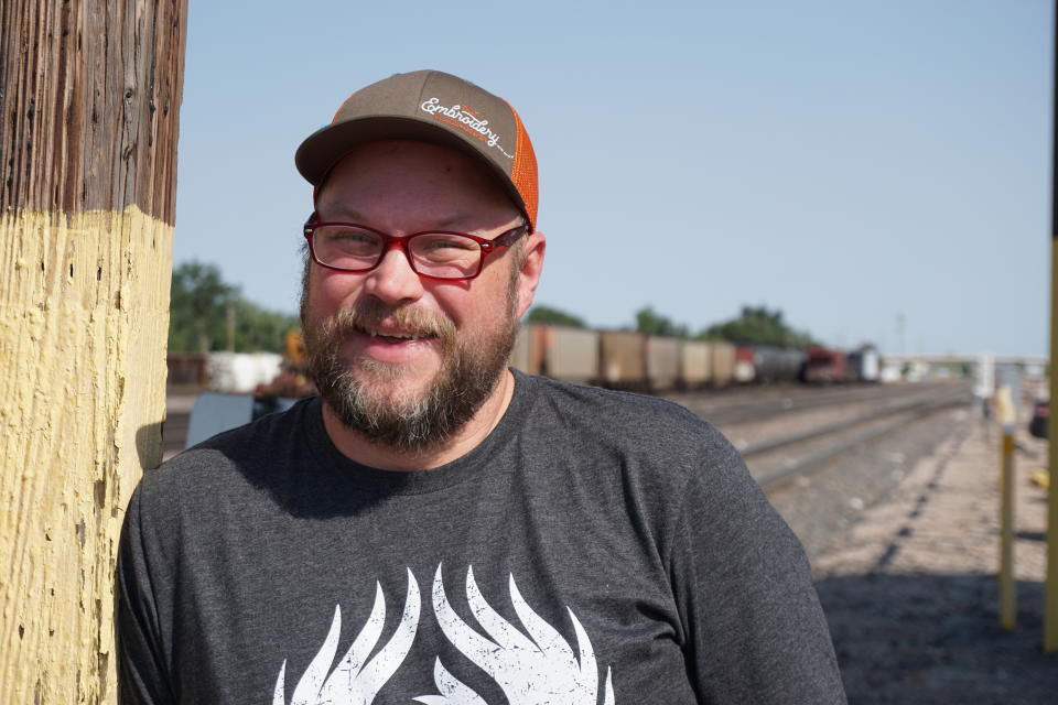 In this Thursday, Sept. 5, 2019 photo Blackjewel heavy equipment operator Rory Wallet poses for a photo in Gillette, Wyo. The shutdown of Blackjewel LLC's Belle Ayr and Eagle Butte mines in Wyoming since July 1, 2019 has added yet more uncertainty to the Powder River Basin's struggling coal economy. (AP Photo/Mead Gruver)