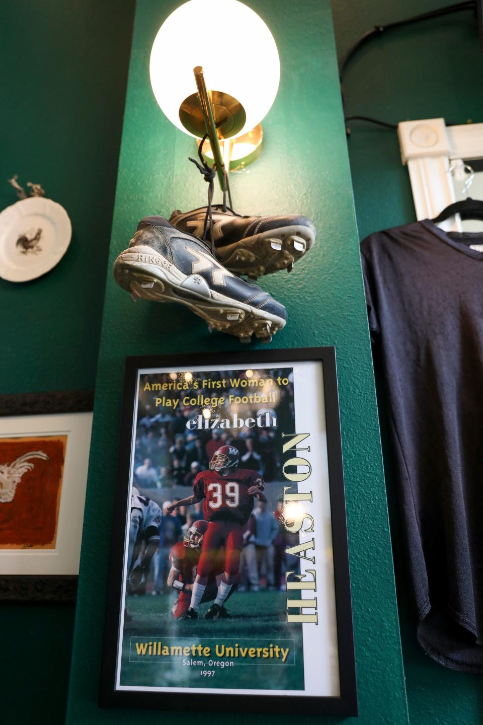 Women's sports memorabilia decorates the newly opened bar, Icarus, on March 18 in Salem.