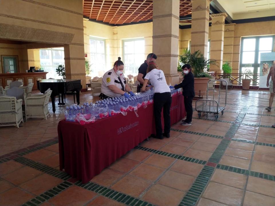 Water is being handed out at the hotel (via Reuters)