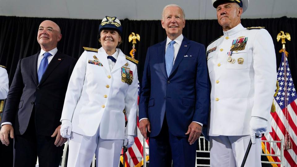 President Joe Biden poses for a photo with Homeland Security Secretary Alejandro Mayorkas, left, Adm. Linda Fagan, Commandant of the U.S. Coast Guard, second from right, and Adm. Karl Schultz, right, during a change of command ceremony at U.S. Coast Guard headquarters, Wednesday, June 1, 2022, in Washington. Schultz, was relieved by Fagan as the Commandant of the U.S. Coast Guard. (Evan Vucci/AP)