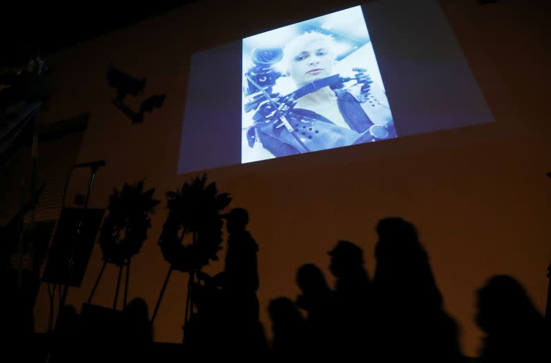 People attend a vigil for cinematographer Halyna Hutchins, who was fatally shot on the film set of "Rust", in Burbank