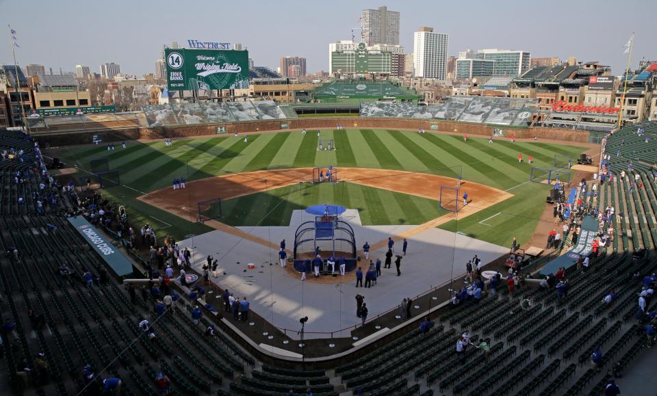 People begin to fill the stands at Wrigley Field in Chicago before the 2015 season opener.