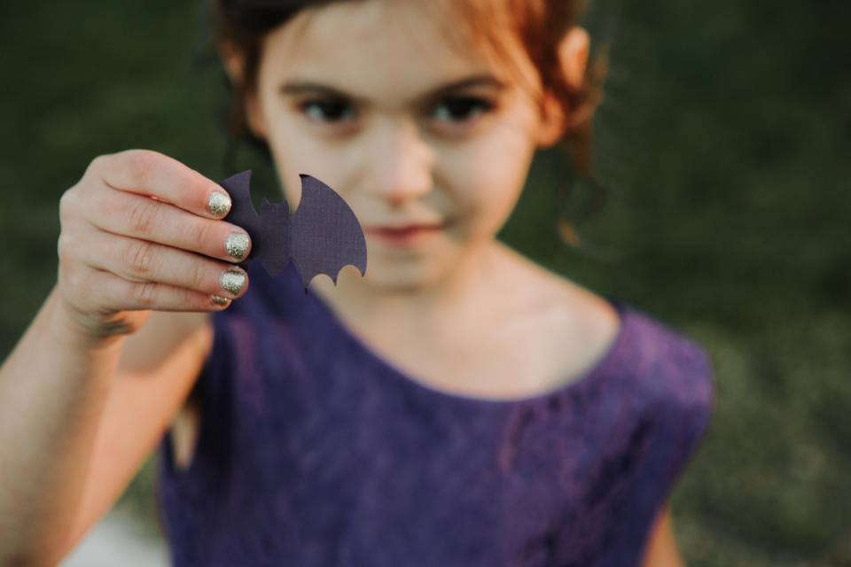 Paper bats were thrown instead of petals.&nbsp;