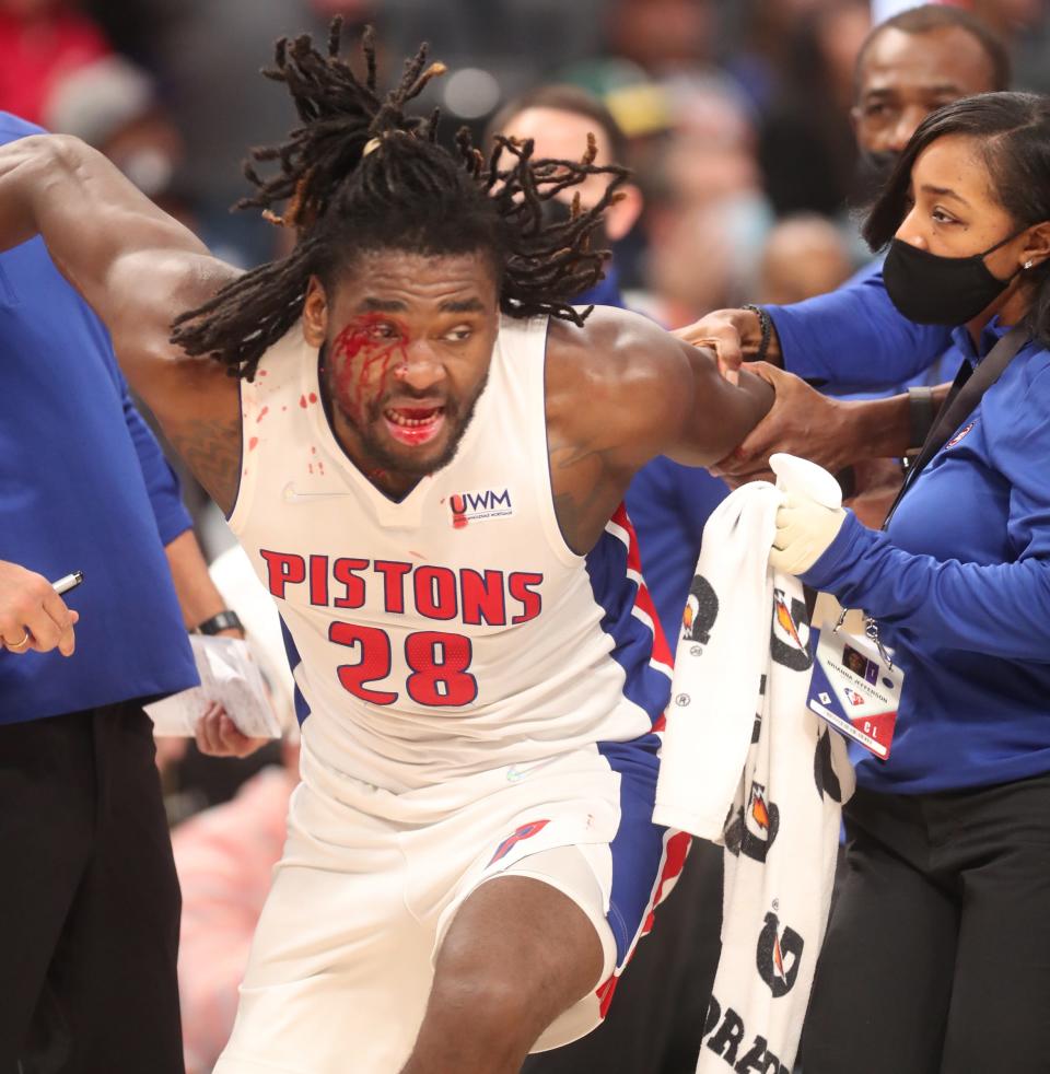 Detroit Pistons center Isaiah Stewart runs after Los Angeles Lakers forward LeBron James after being hit in the face by James. Both players were ejected from the game Sunday, Nov. 21, 2021 at Little Caesars Arena.