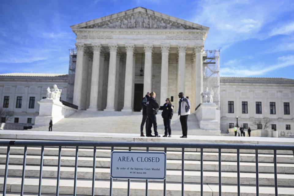 PHOTO: People gather outside the US Supreme Court during the hearing in Washington, February 8, 2024. (Celal Gunes/Anadolu via Getty Images)