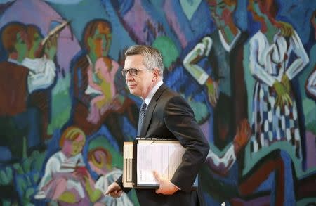 German Interior Minister Thomas de Maiziere arrives for a cabinet meeting at the Chancellery in Berlin, Germany, March 23, 2016. REUTERS/Fabrizio Bensch