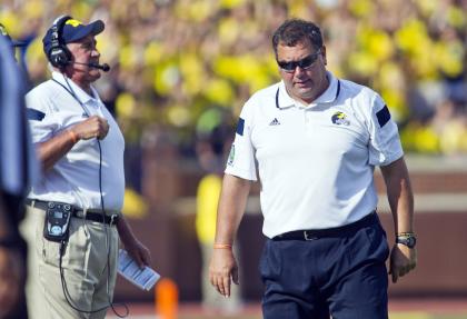 Michigan's Brady Hoke reacts on the sideline during his team's loss to Minnesota. (AP)