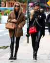 <p>Sisters Nicky and Paris Hilton twin in black leather pants while out and about in N.Y.C. on Tuesday.</p>