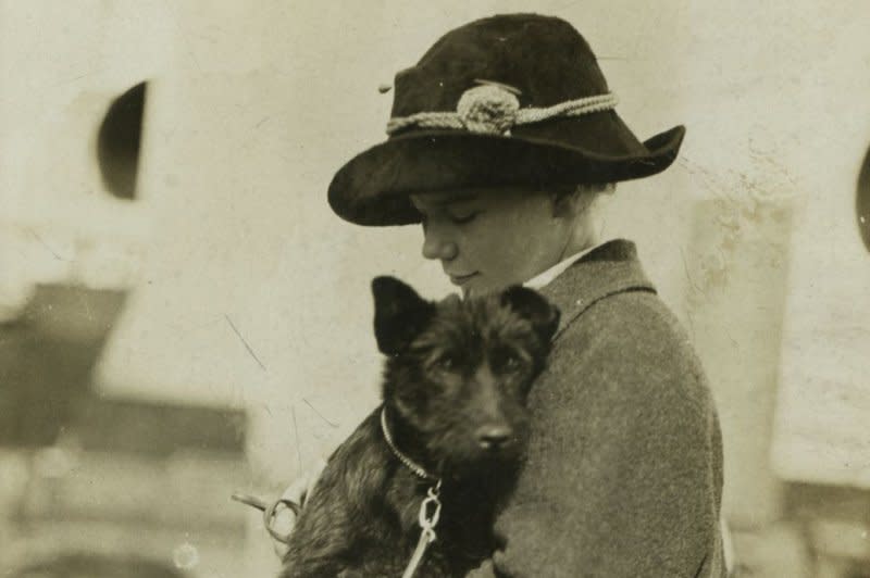 Ethel Roosevelt, daughter of former President Theodore Roosevelt, is pictured holding her dog Bongo during a family trip on board the SS Kaiserin Auguste Victoria in June 1910. Roosevelt cured Bongo of seasickness on this day in 1910. Photo courtesy Theodore Roosevelt Center