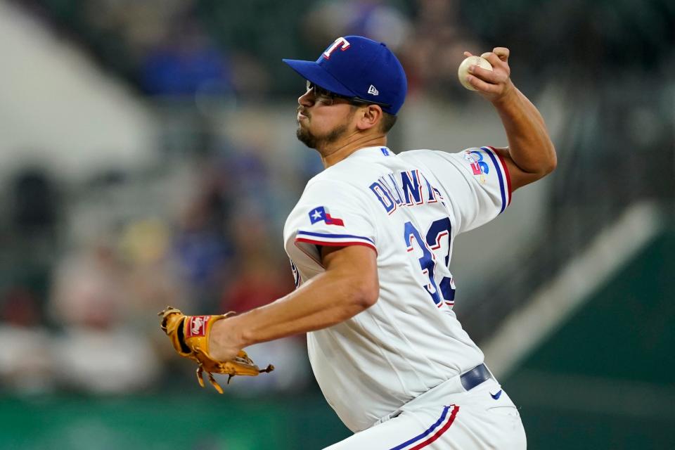 Rangers starting pitcher Dane Dunning pitches against the Angels in a 2022 game.