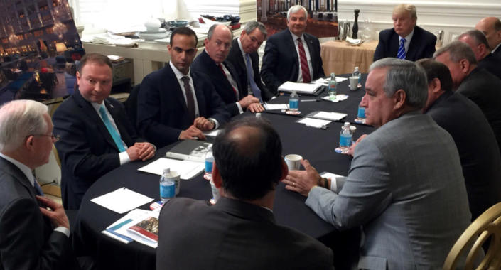 In this photo from Donald Trump’s Twitter account, George Papadopoulos, third from left, sits at a table with then candidate Trump and others at what is labeled as a national security meeting in Washington. The photo was posted on March 31, 2016. (Photo: Donald Trump’s Twitter account via AP)