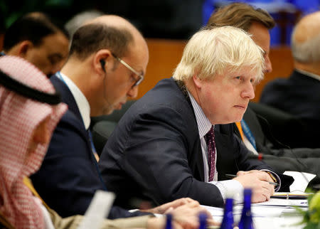 British Foreign Minister Boris Johnson listens to remarks at the morning ministerial plenary for the Global Coalition working to Defeat ISIS at the State Department in Washington, U.S., March 22, 2017. REUTERS/Joshua Roberts