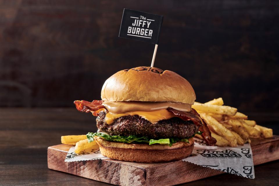 The Jiffy Burger at Ford's Garage is a half-pound Black Angus patty with American cheese, applewood smoked bacon, chopped Romain and creamy peanut butter on a brioche bun.