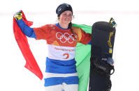 <p>Michela Moioli of Italy stands on the podium after winning gold in the Big Final of the Women’s Snowboard Cross. (Getty) </p>