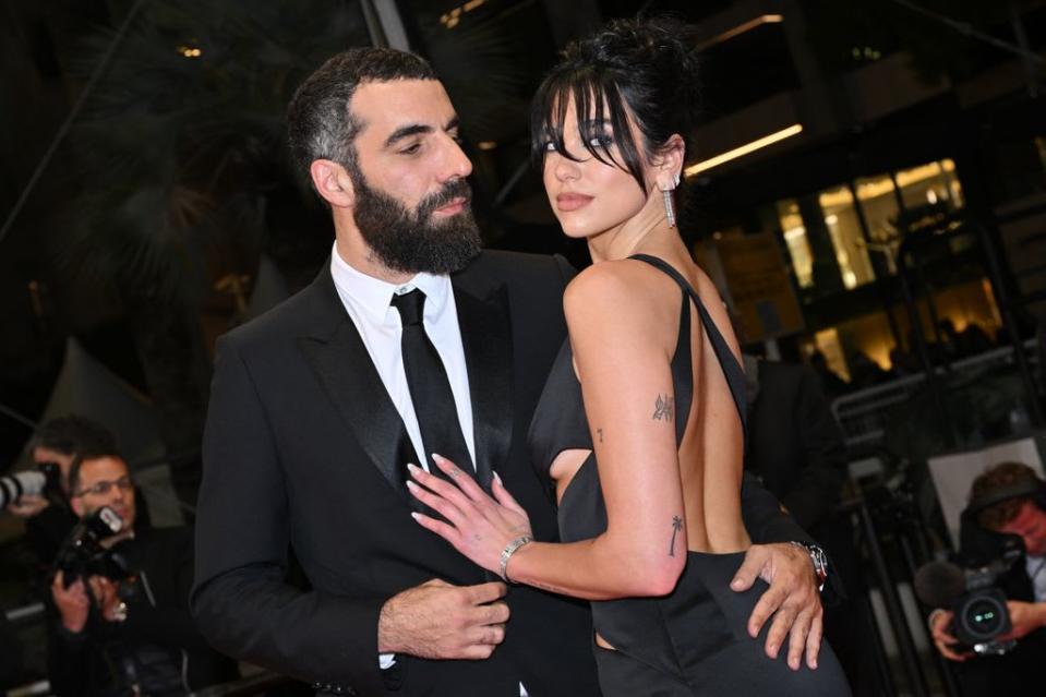 Dua Lipa and Romain Gavras attending the "Omar La Fraise (The King of Algiers)" red carpet during the 76th annual Cannes film festival at Palais des Festivals 