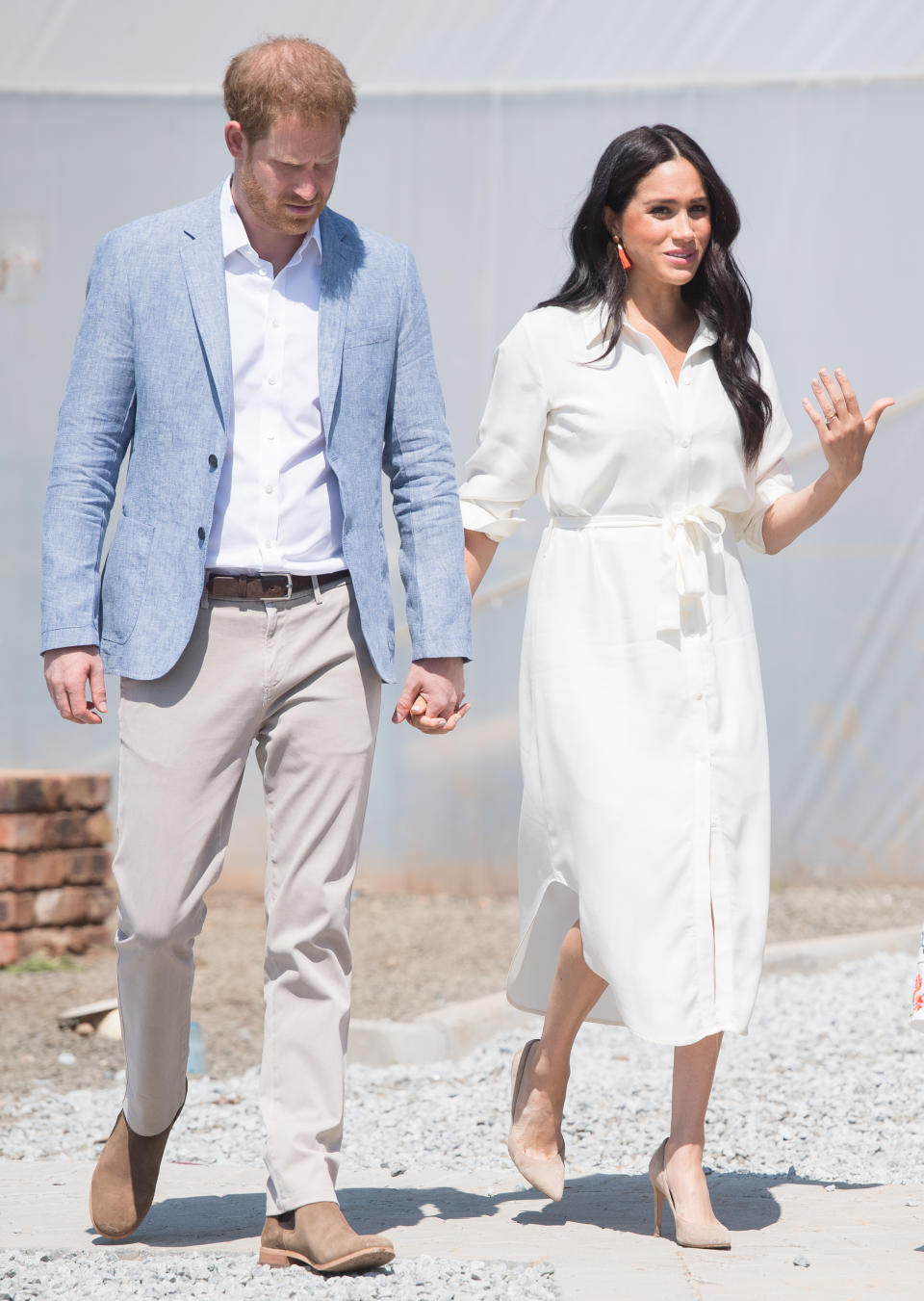 JOHANNESBURG, SOUTH AFRICA - OCTOBER 02: Prince Harrye, Duke of Sussex and Meghan, Duchess of Sussex visit the Tembisa Township to learn about Youth Employment Services on October 02, 2019 in Tembisa, South Africa.  (Photo by Samir Hussein/WireImage)